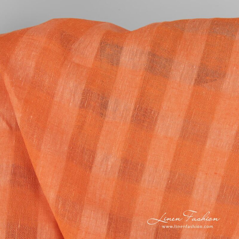 Checked linen fabric in peachy orange.