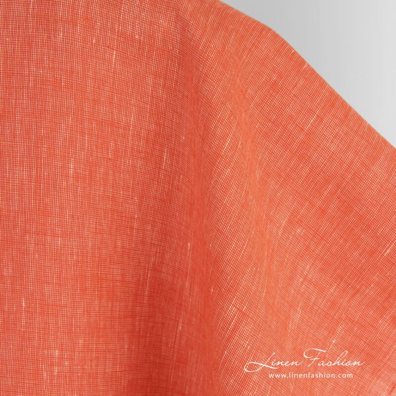Linen fabric in red and yellow melange for clothes and home textile