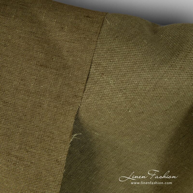 Diagonal patterned moss green linen fabric.