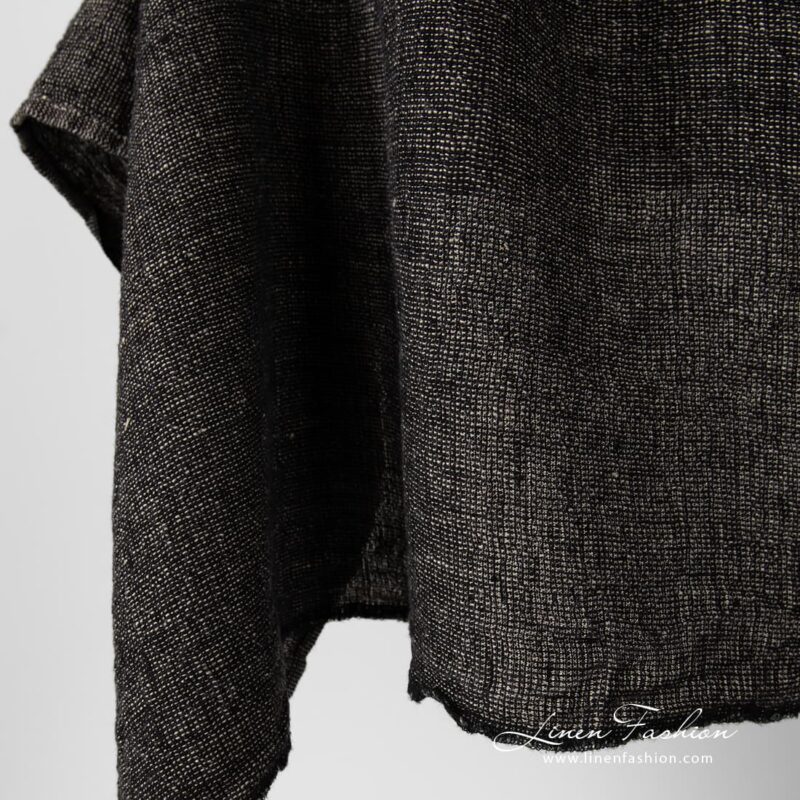 Washed 100% linen fabric in black and flax melange.