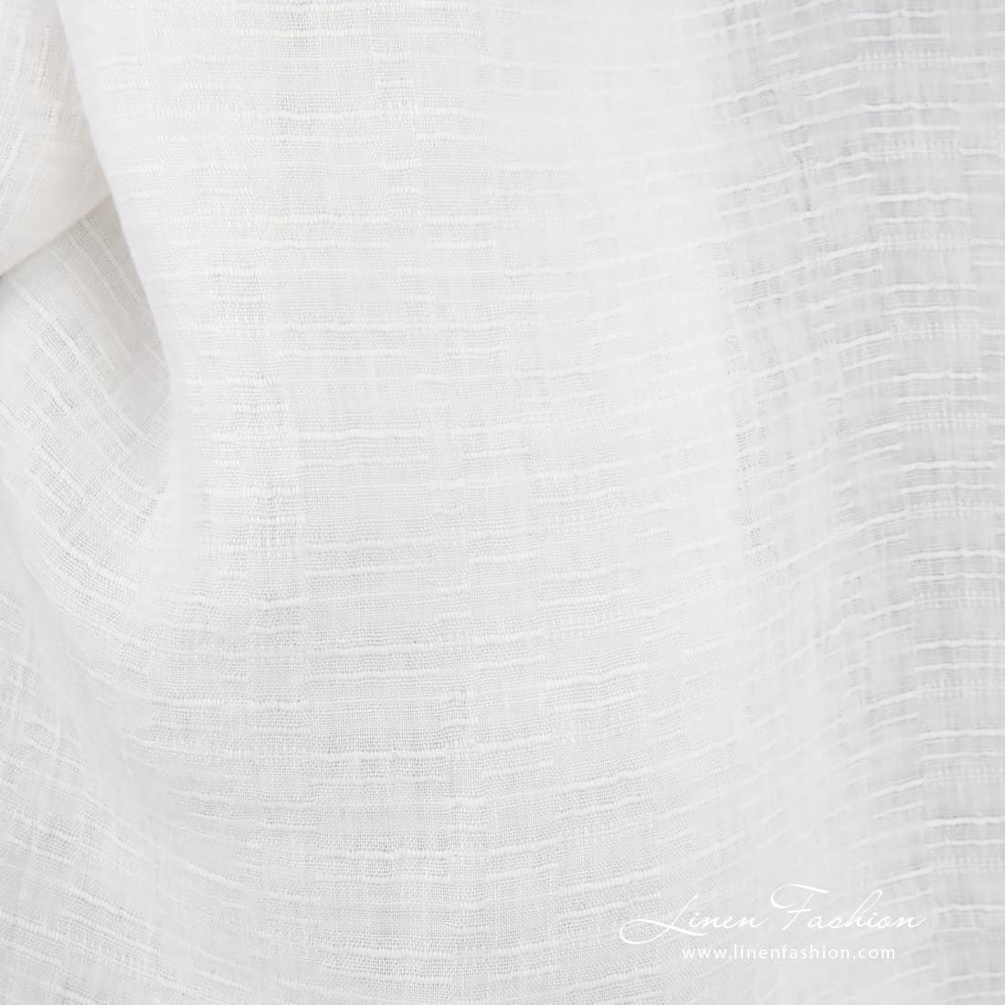 White linen fabric in stripes, specially washed