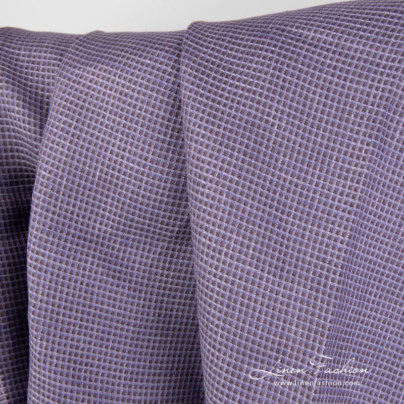 Checked linen fabric in purple colour.
