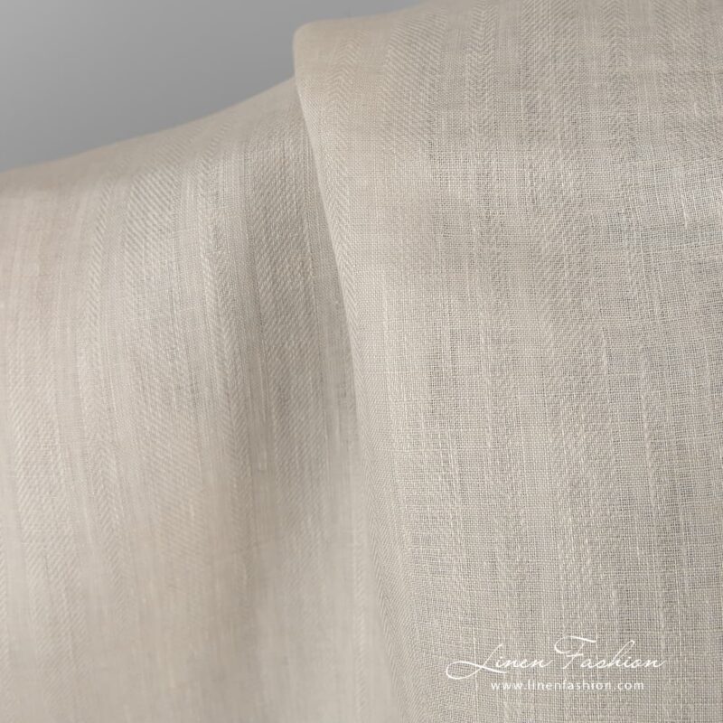 Patterned 100% linen fabric in ecru.
