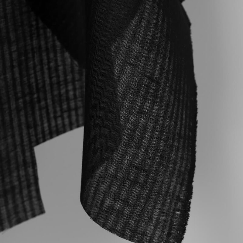 Sheer linen fabric in black stripes edge