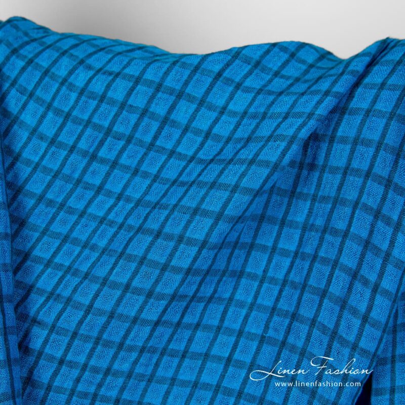 Linen fabric in bright blue checks, perfect for clothes and home textile