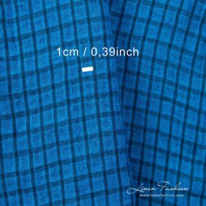 Checked linen fabric woven from brilliant blue and dark turquoise yarns