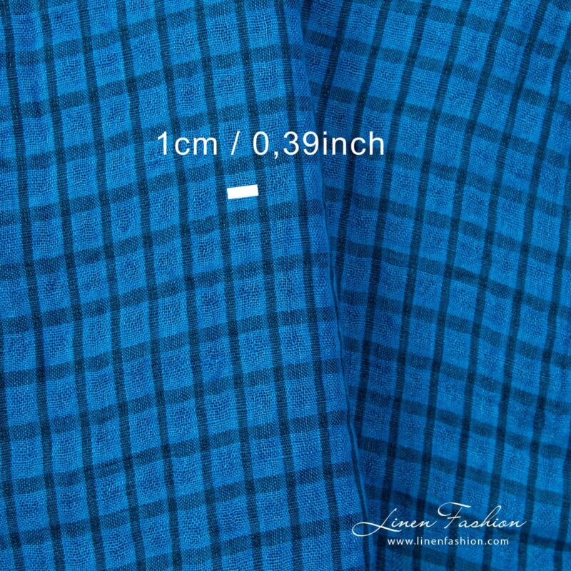 Checked linen fabric woven from brilliant blue and dark turquoise yarns