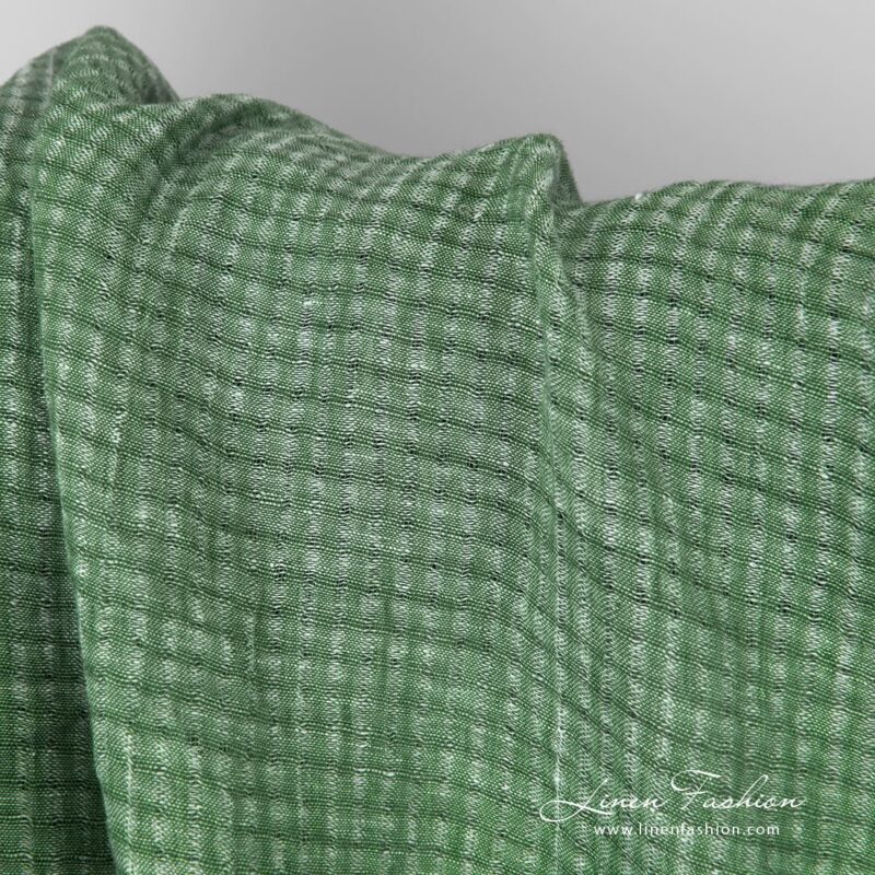 Green openweave linen fabric with checks