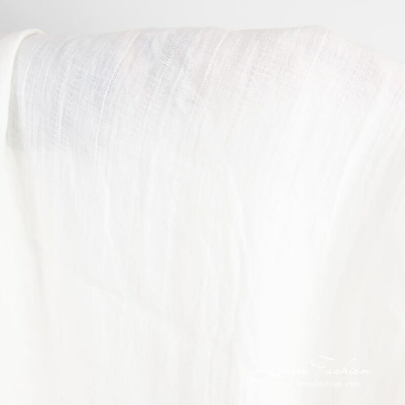 Off-white linen fabric with delicate vertical stripes