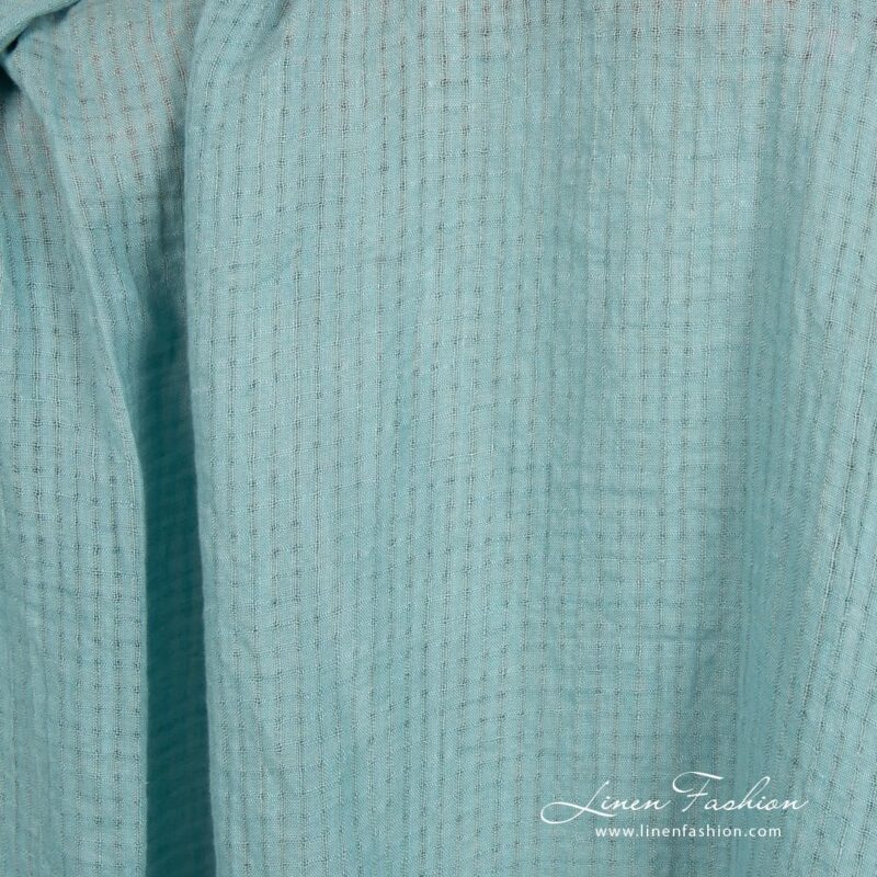 Blue green linen fabric in transparent checks, specially washed