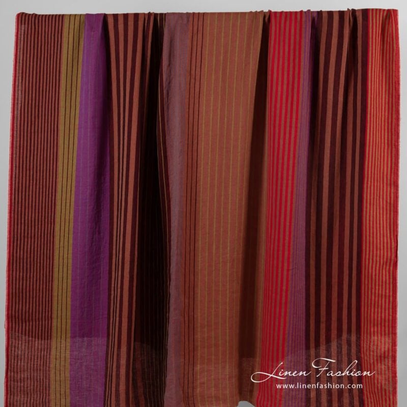Linen fabric in vertical stripes, woven from black, brown, green and violet yarns
