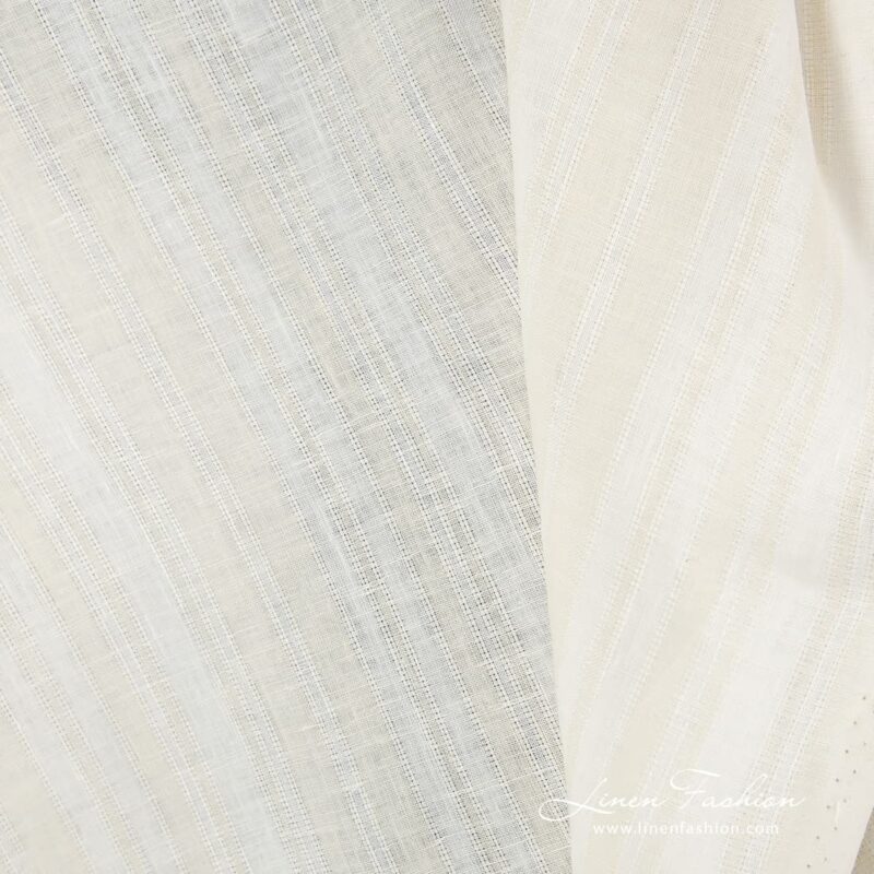 Ecru coloured linen fabric in stripes.