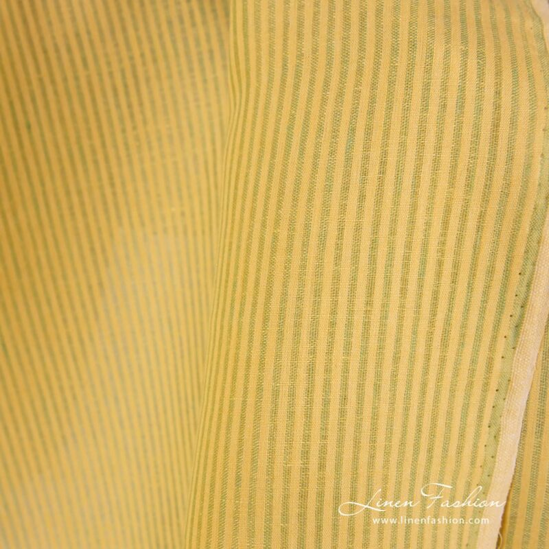 Yellow and light green striped linen fabric.