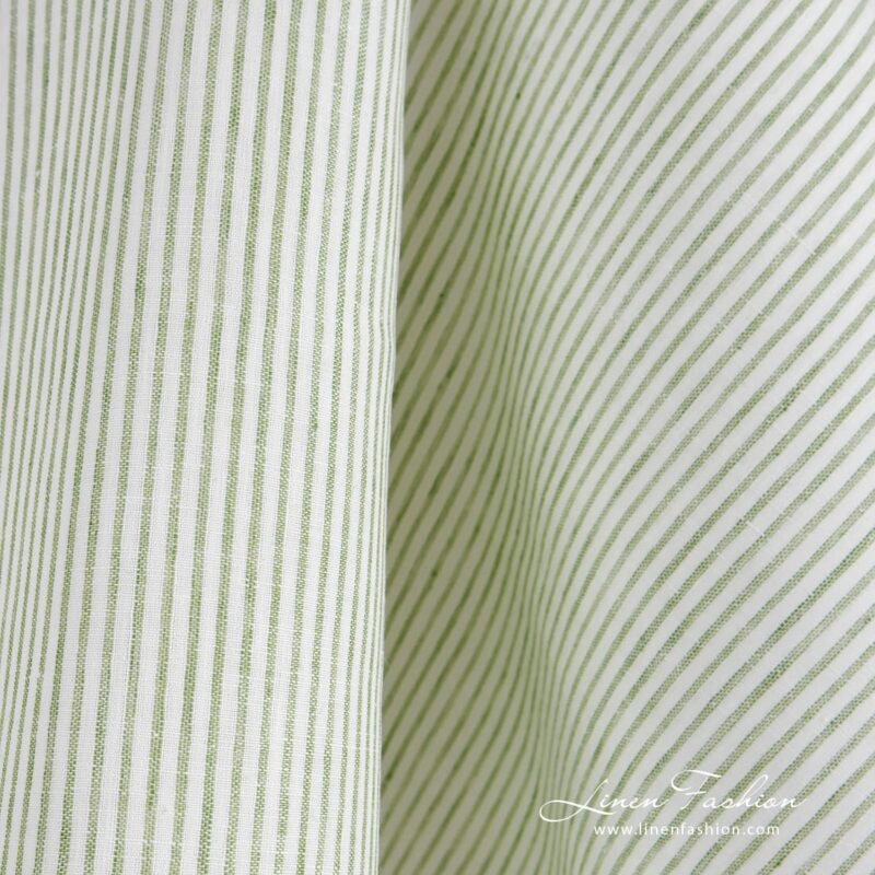 Linen fabric in vertical green stripes
