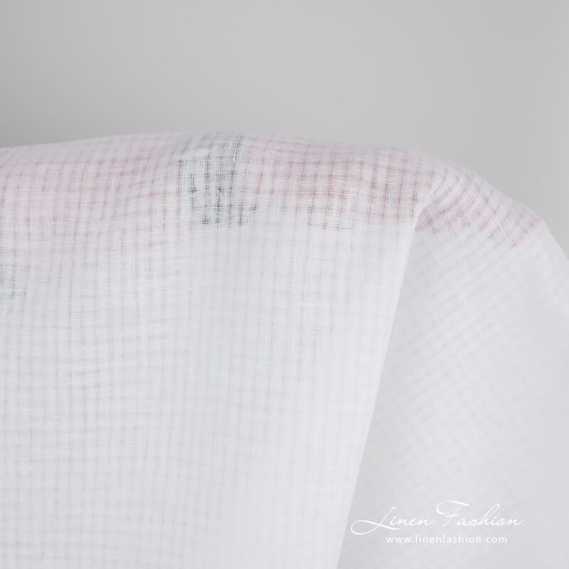 Optical white linen fabric in transparent checks, perfect for shawls, scarves, tablecloths and curtains