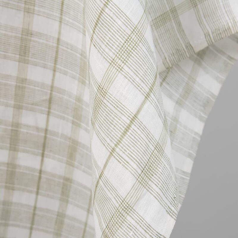 Linen fabric off-white with light olive green checks edge