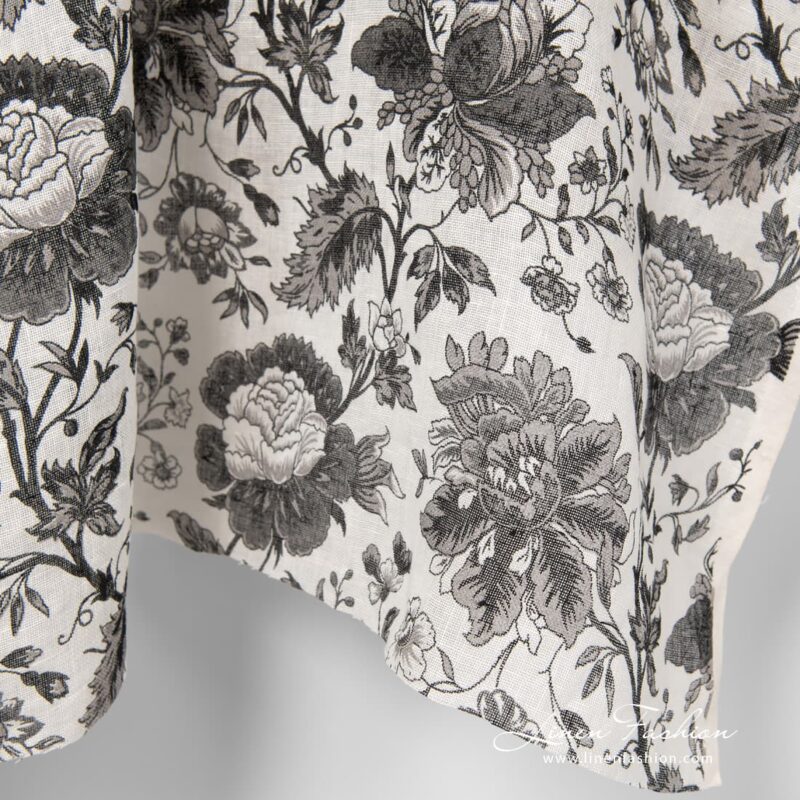 100% linen fabric with black flowers.