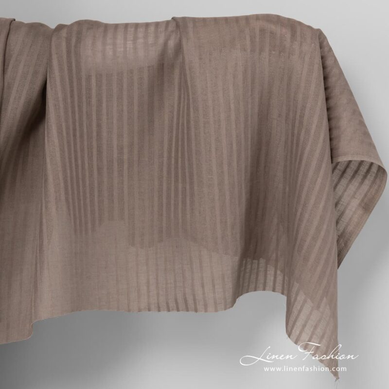 Grey linen fabric in vertical stripes.