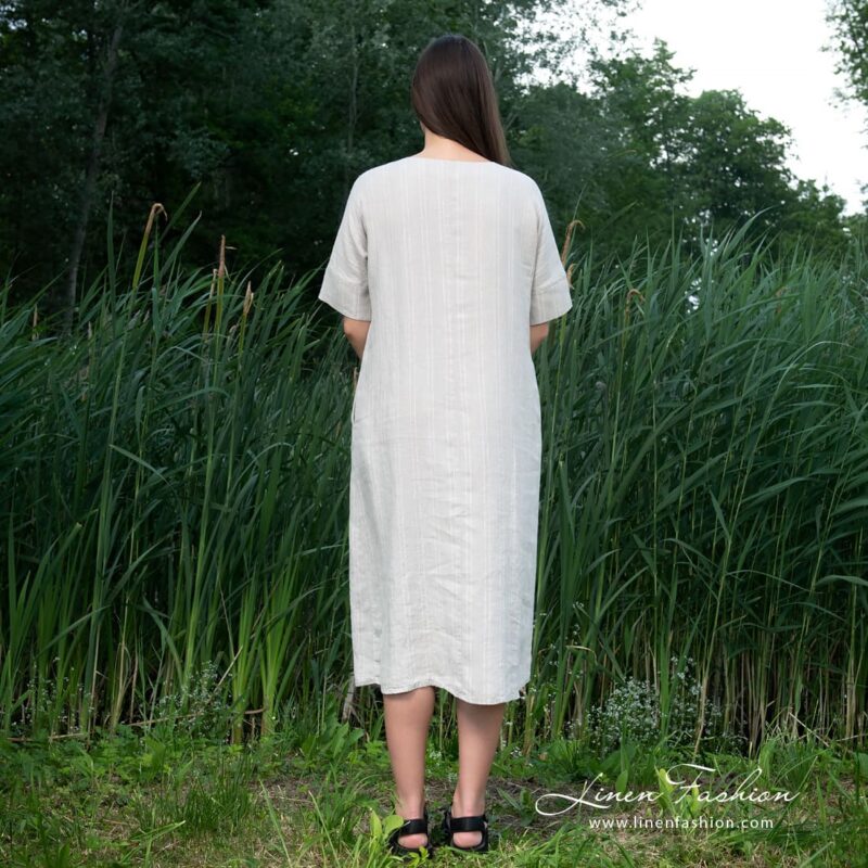 Grey linen dress in widening silhouette
