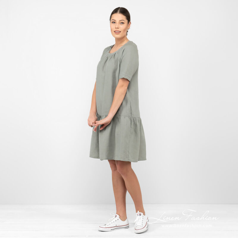 linen wide green dress from side.