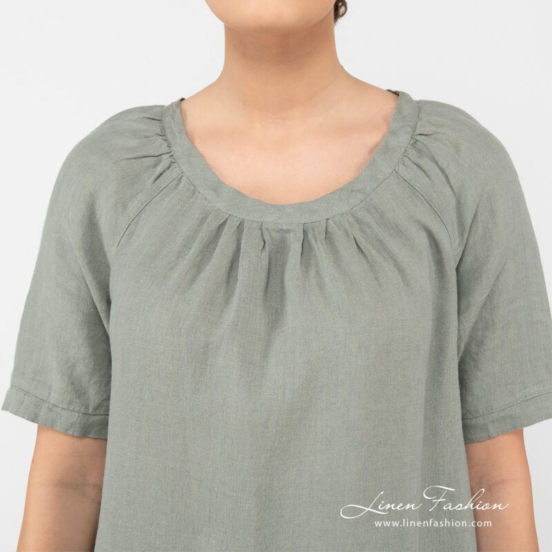 linen wide green dress with raglan sleeves.