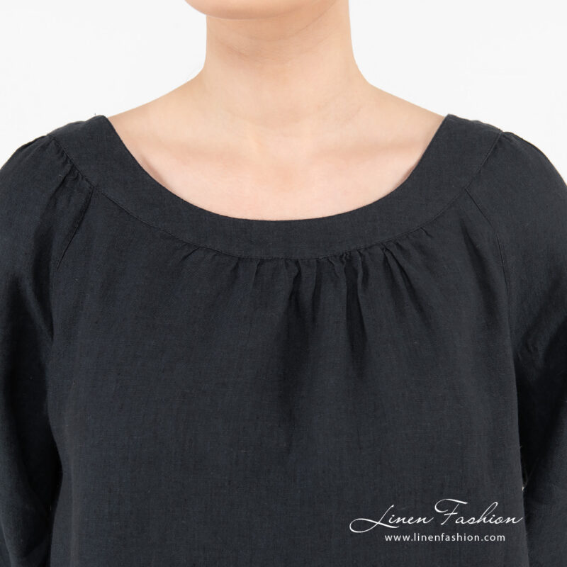 navy linen blouse with rounded neck.