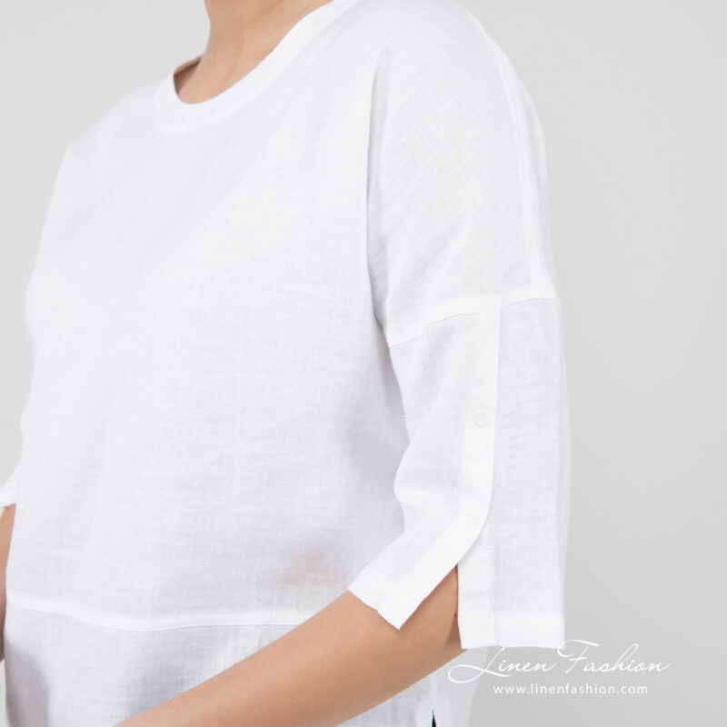 white linen blouse 3/4 sleeves with press buttons.
