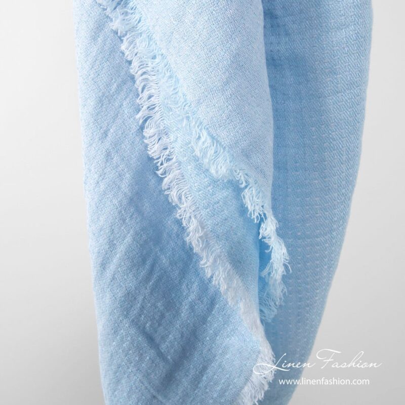 Linen scarf in light blue color.
