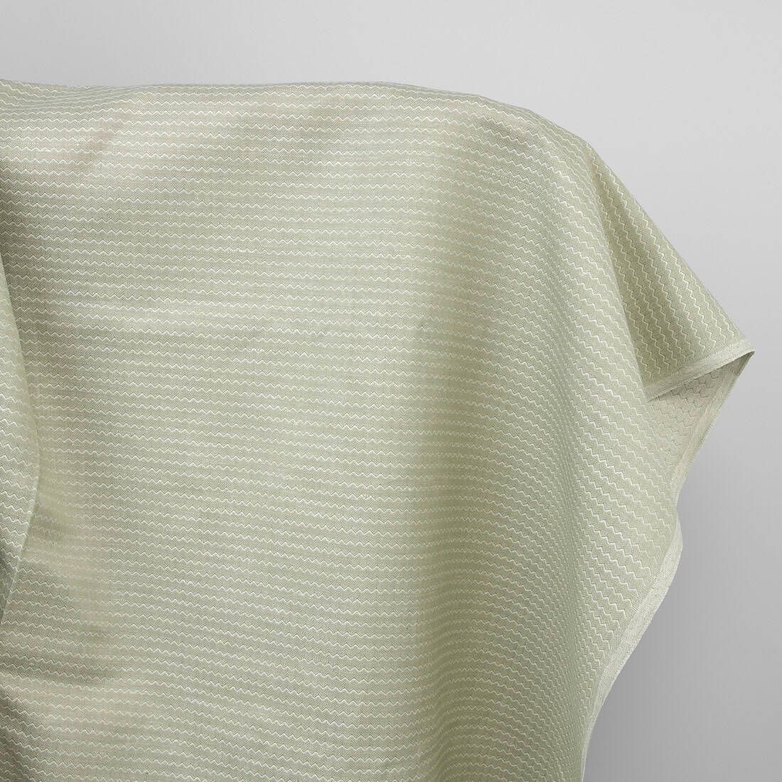 Light green linen cotton fabric in a zigzag pattern