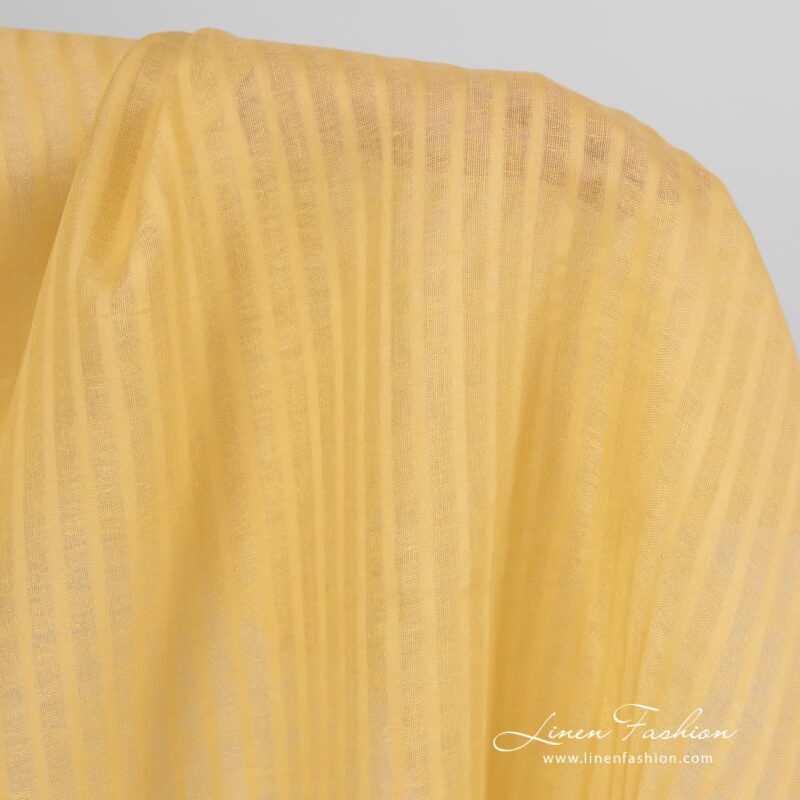 Striped 100% linen fabric in yellow.