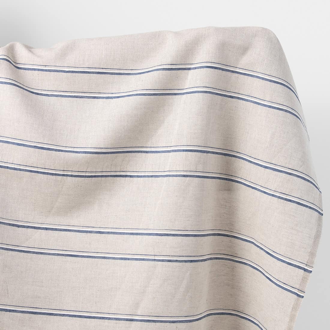 Linen cotton fabric white and natural melange with blue stripes